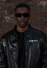 Black Leather Jacket – "I’m Worth A Lot,"