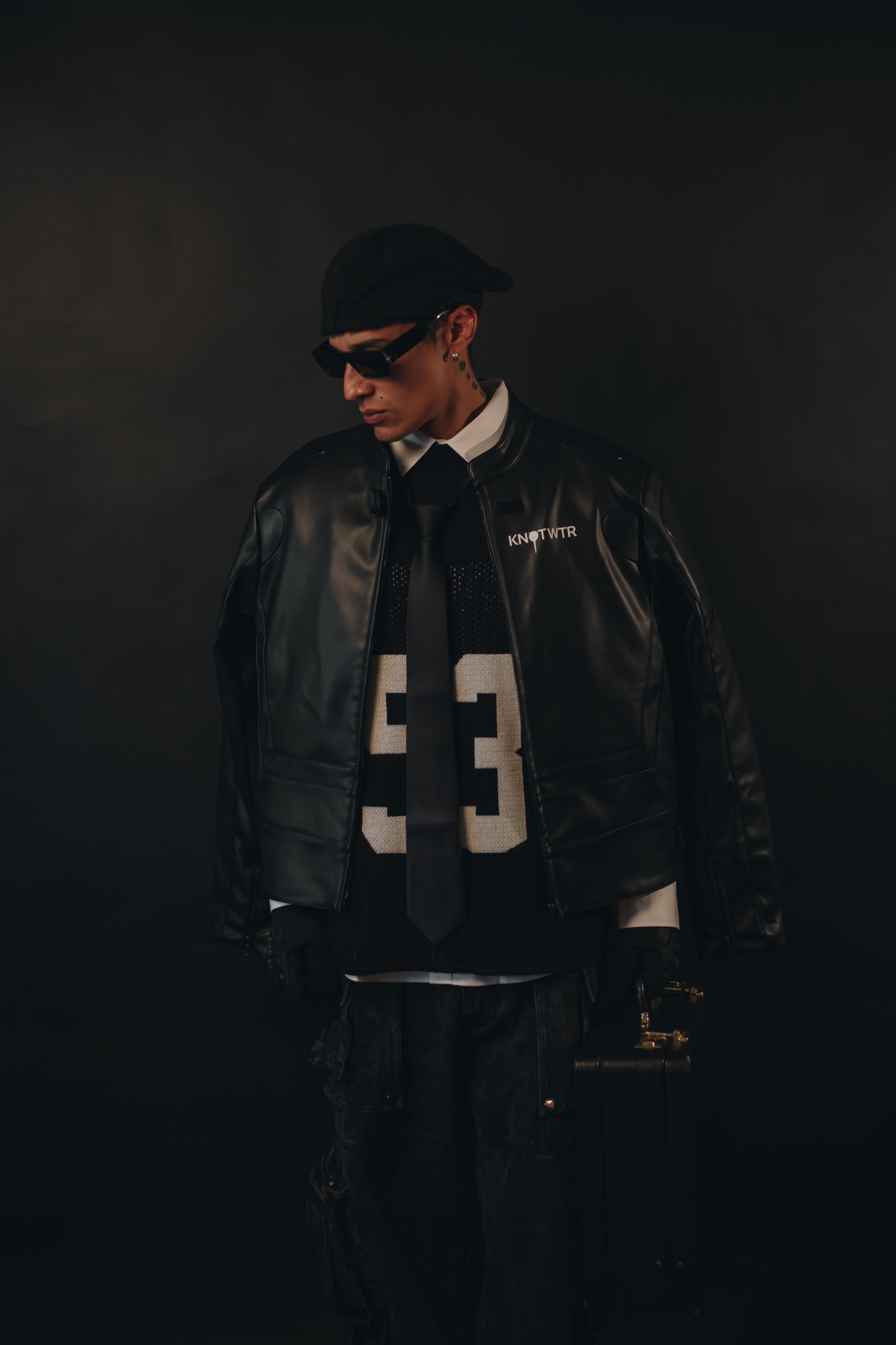 Black Leather Jacket – "I’m Worth A Lot,"